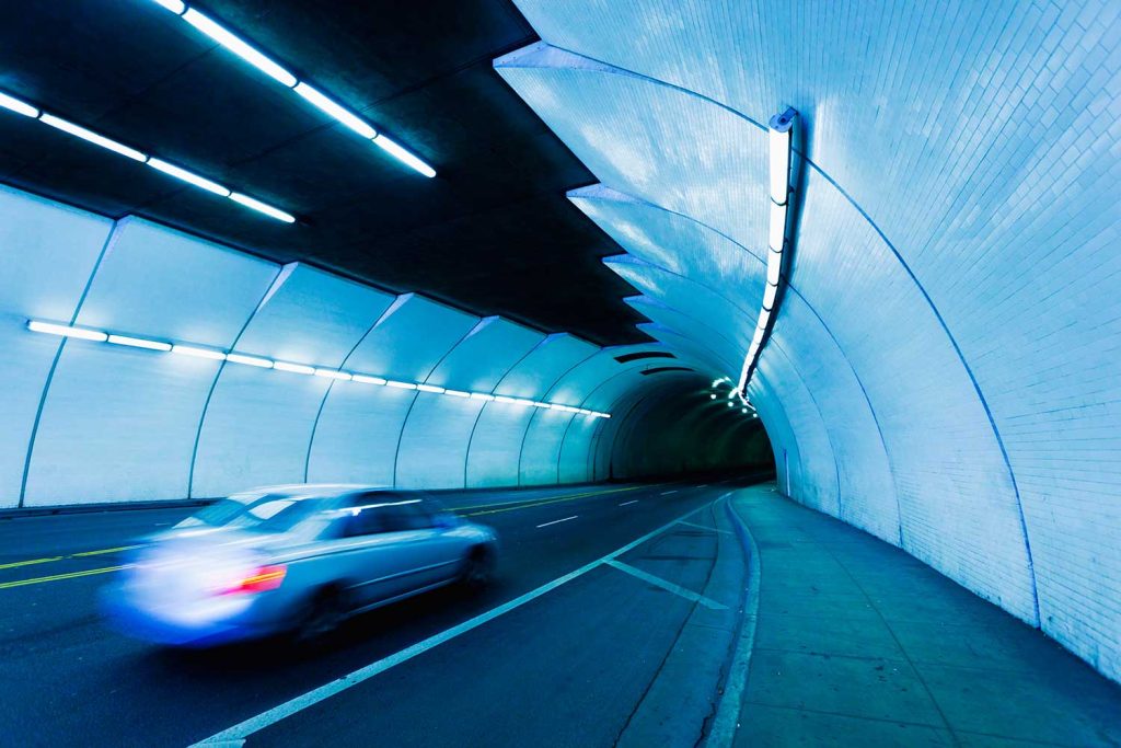Urban tunnel car moving with motion